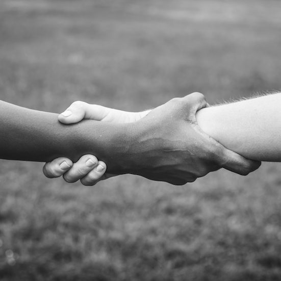 People holding on to each other