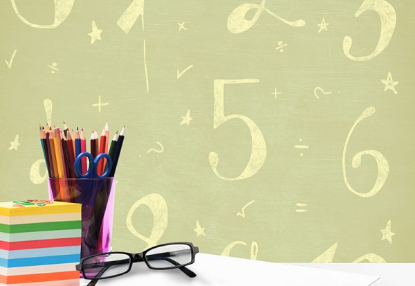 Spectacles and pen holder against mathematical background Spectacles and pen holder against mathematical image