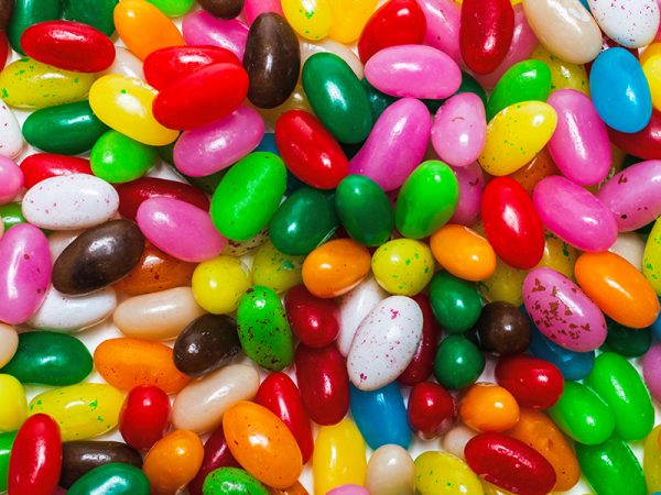 Colourful jelly beans isolated on white.