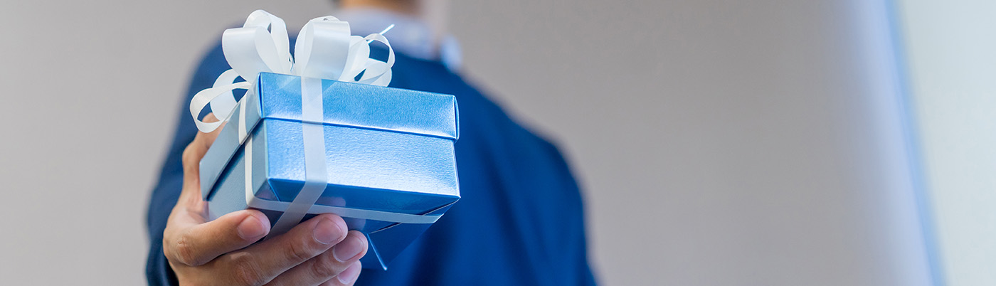 Man holding gift box package