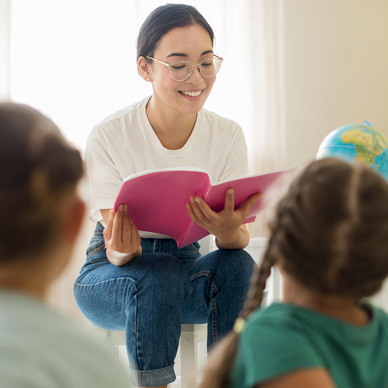 front-view-woman-reading-something-her-students