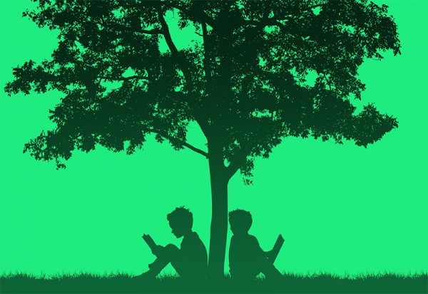 Silhouettes of children read book under tree Silhouettes of children read book under tree