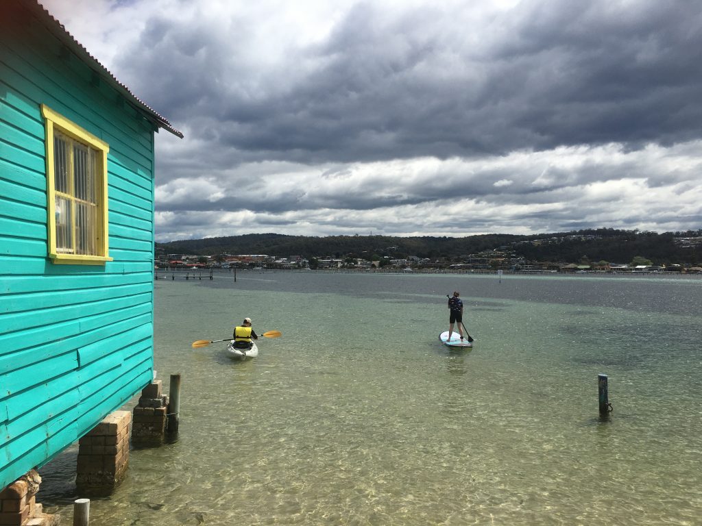 recount-image-three image of kayak and paddle board