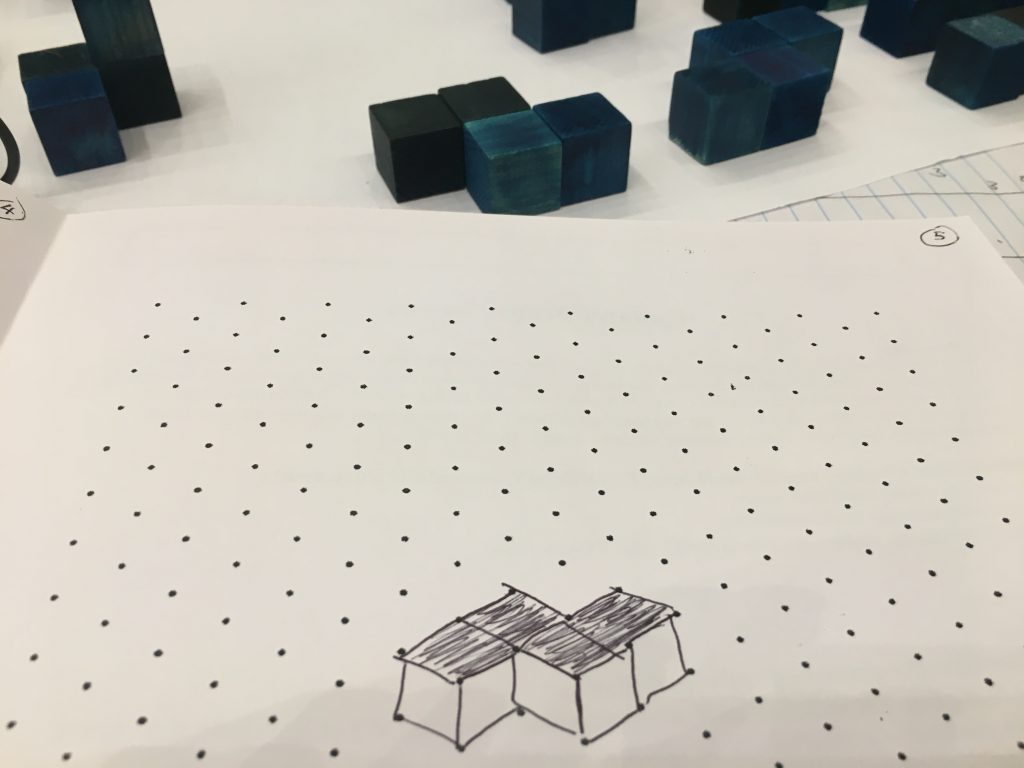 image-3-mansw building using four blocks and draeing of it on isometric dot paper