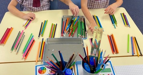 image-five-hundreds-chart image of students counting by fives