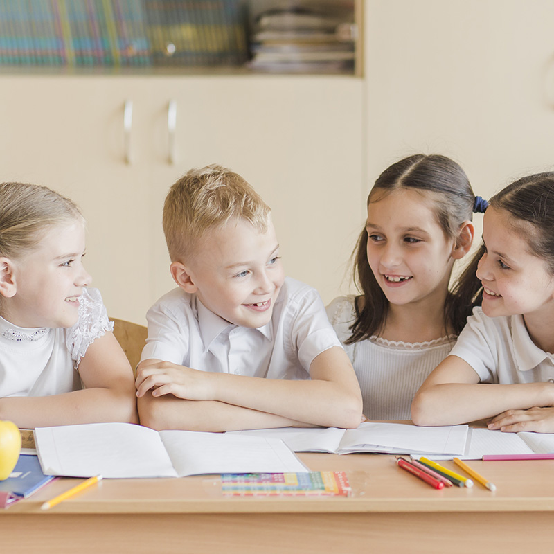 cheerful-kids-chatting-during-lesson