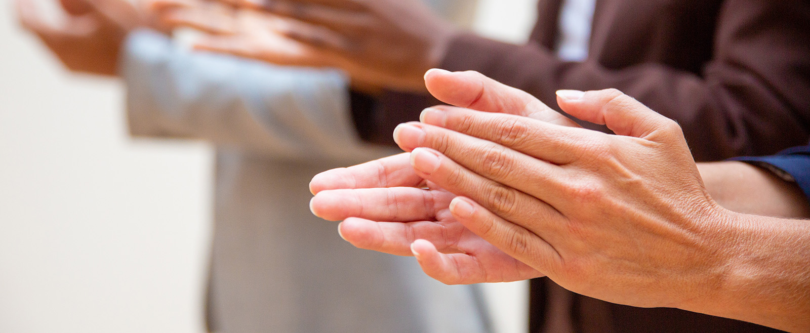 Hands of business people applauding speaker. Business group appreciating seminar, training or conference