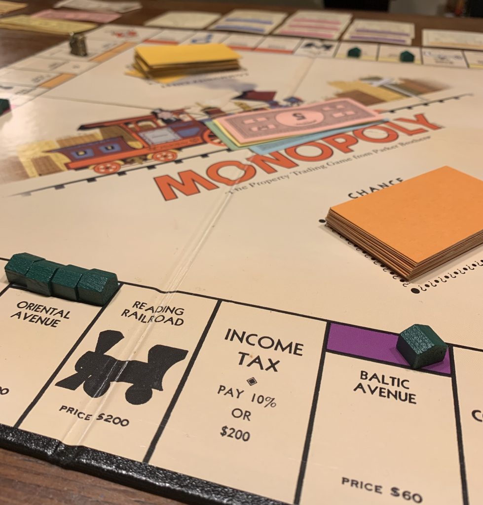 image-three-monopoly-incometax monopoly board showing the income tax square