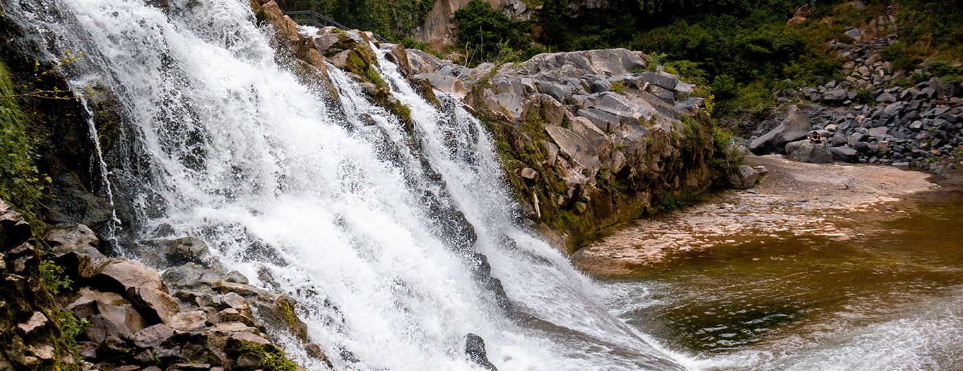 Beautiful rocky waterfall at daytime