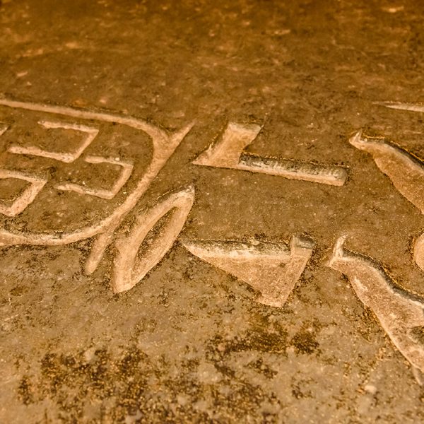 Egyptian ancient hieroglyphs on a stone wall