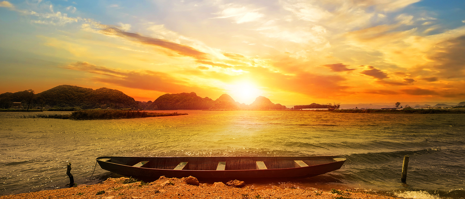 beautiful-sunset-beach-landscape-with-boat-image