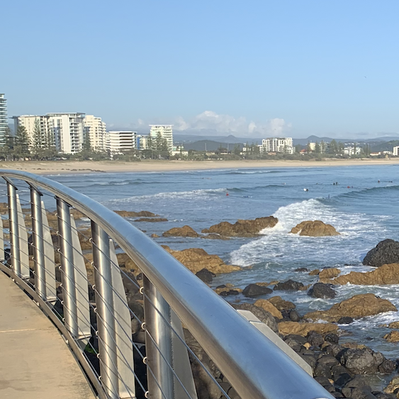 square image changing times image of beach at Coolongatta